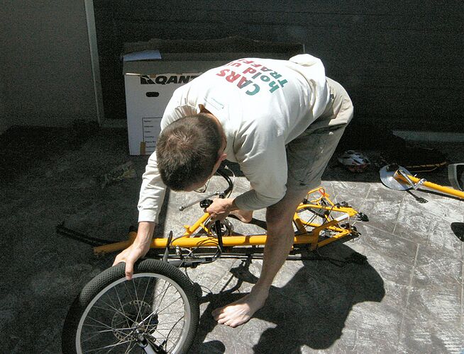 Assembling my bike in Christchurch. I discovered that it very nearly goes into a big Qantas bike box, but ~10cm pokes out. Which was a big pain. So going home I didn't put it in a box. Much easier.