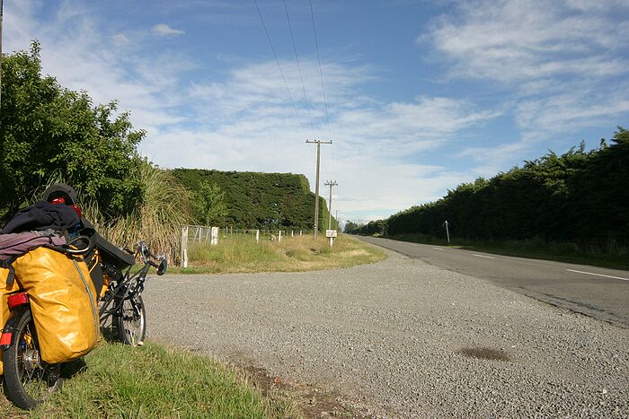 Heading west out of Rolleston towards the Southern Alps. Passing through farmland and it's all very flat.
