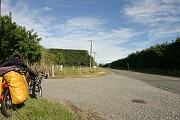 Heading west out of Rolleston towards the Southern Alps. Passing through farmland and it's all very flat.