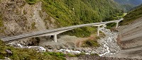 Old road down there on the right. Well, the scree slope where they old road used to get rebuilt several times a year... which is why they finally got the tech and money to built the viaduct. Used to be a very steep road with very tight corners up from the scree to this point.