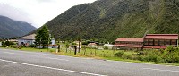 30 minutes later, 500m lower... The town of Otira, most famous (to me) because most of it was for sale at one stage. The whole town. Conditional, of course, on the buyer keeping it going... it's still here, so I assume that worked.