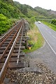 Railway line right next to the road on the way out the Greymouth. I suspect that is a train just coming round the corner - lots of coal trains up and down, coal is mined all over the coast and trucked (or rarely railed) to a depot, then on the train through Arthur's Pass to Christchurch. So the roads can be a bit busy, although I didn't have any problems. In my experience it's not the truckies that I have to worry about, it's the morons who forget that they're driving a campervan or towing a caravan... so their vehicle is 30cm wider each side than usual.