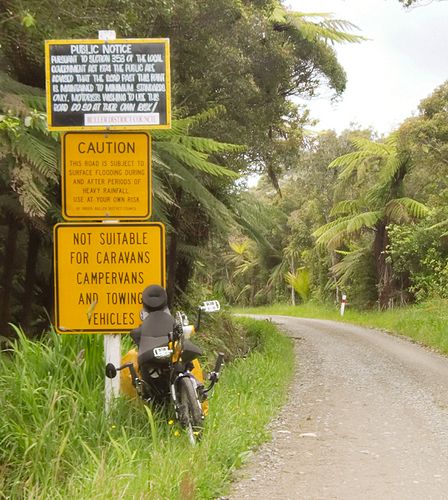 Warning signs on Bullock Creek Road, near Punakaiki.