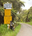Warning signs on Bullock Creek Road, near Punakaiki.
