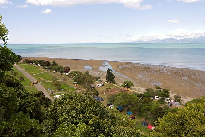 McKee Domain at Kina Beach between Nelson and Kaiteri. Nelson in the background