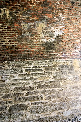 Inside there's this mix of local rock quarried into slabs and used as bricks, with fired clay bricks above that.