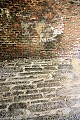 Inside there's this mix of local rock quarried into slabs and used as bricks, with fired clay bricks above that.
